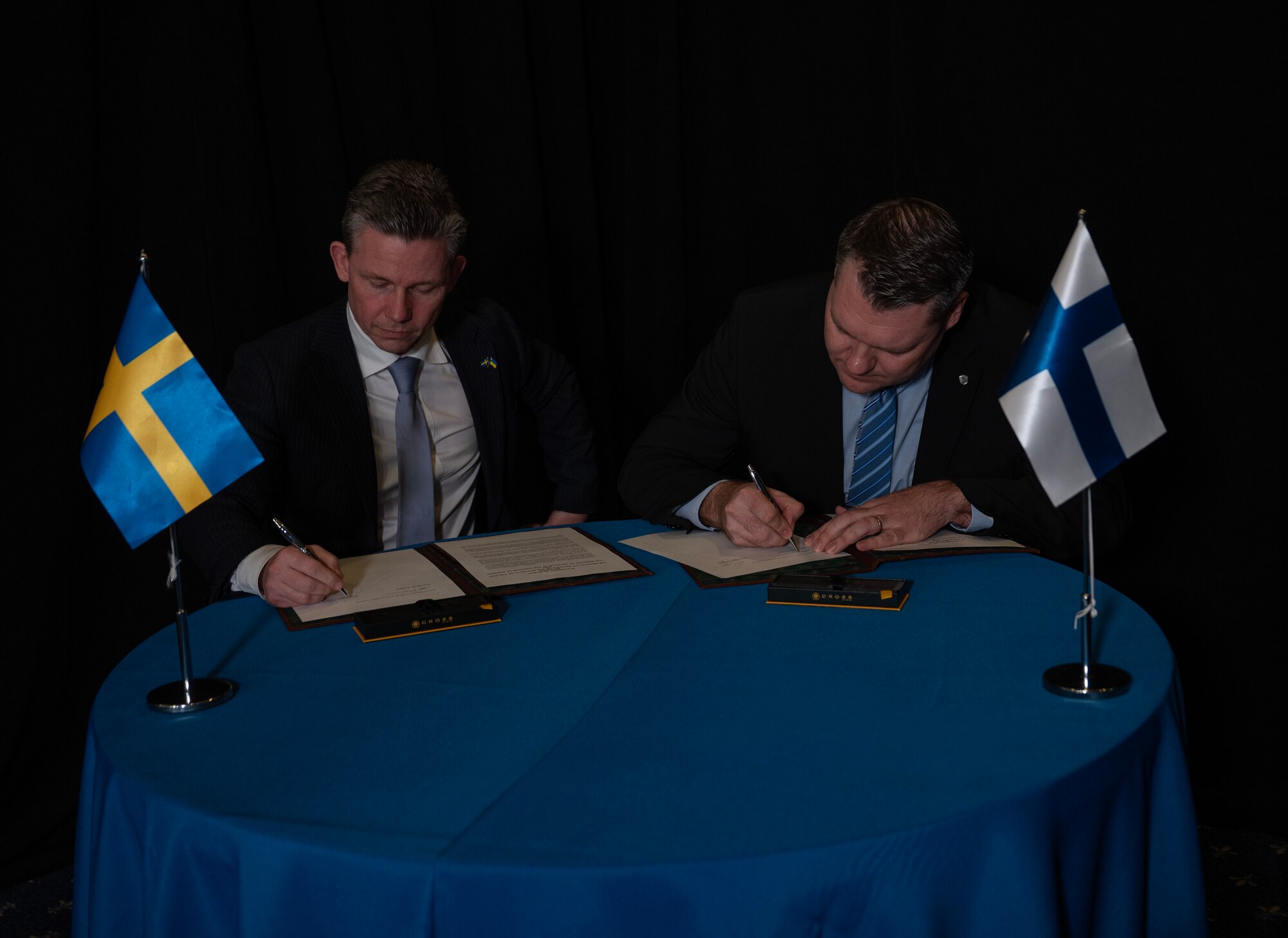 Swedish Minister of Defence Pål Jonson and Finnish Minister of Defence Antti Kaikkonen sign a statement of intent during the Ukraine Defense Contact Group at Ramstein Air Base, Germany