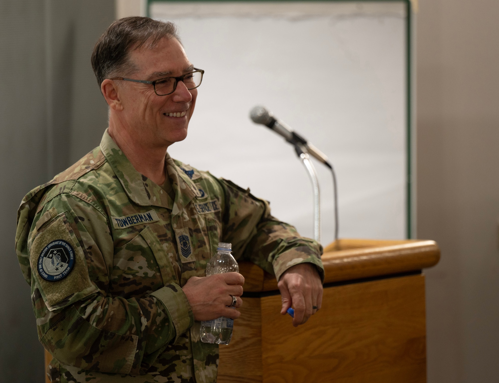 Chief Master Sergeant of the Space Force Roger A. Towberman answers questions from Airmen and Guardians during a town hall Jan. 23, 2023 at Ramstein Air Base, Germany