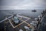 BALTIC SEA (Jan. 23, 2023) The Arleigh Burke-class guided-missile destroyer USS Roosevelt (DDG 80) transits alongside the Latvian patrol boat LV Viesite (P-07) during a passing exercise, Jan. 23, 2023.