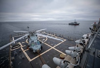 BALTIC SEA (Jan. 23, 2023) The Arleigh Burke-class guided-missile destroyer USS Roosevelt (DDG 80) transits alongside the Latvian patrol boat LV Viesite (P-07) during a passing exercise, Jan. 23, 2023.