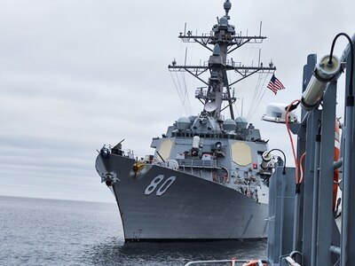 BALTIC SEA (Jan. 23, 2023) The Arleigh Burke-class guided-missile destroyer USS Roosevelt (DDG 80) transits alongside the Latvian patrol boat LV Viesite (P-07) during a passing exercise, Jan. 23, 2023.