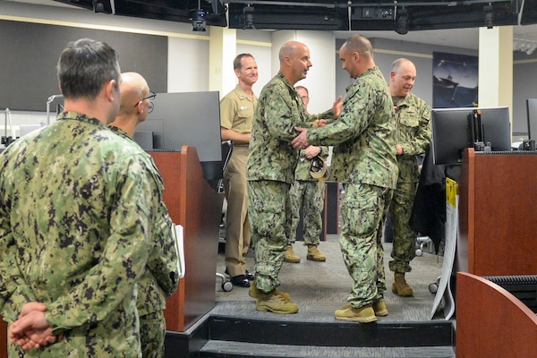 Vice Adm. James Kilby, deputy commander, U.S. Fleet Forces Command, meets with Reserve Sailors participating in MAKO Challenge at the Navy Warfare Development Center in Norfolk. The MAKO Challenge series provides the Navy Reserve an opportunity to enhance their skills and provide continued operational level war support in a realistic, challenging, and dynamically responsive environment.
