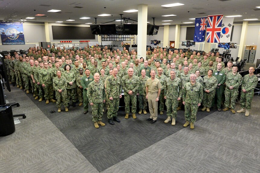 Reserve Sailors participating in MAKO Challenge at the Navy Warfare Development Center in Norfolk pose for a group photo. The MAKO Challenge series provides the Navy Reserve an opportunity to enhance their skills and provide continued operational level war support in a realistic, challenging, and dynamically responsive environment.