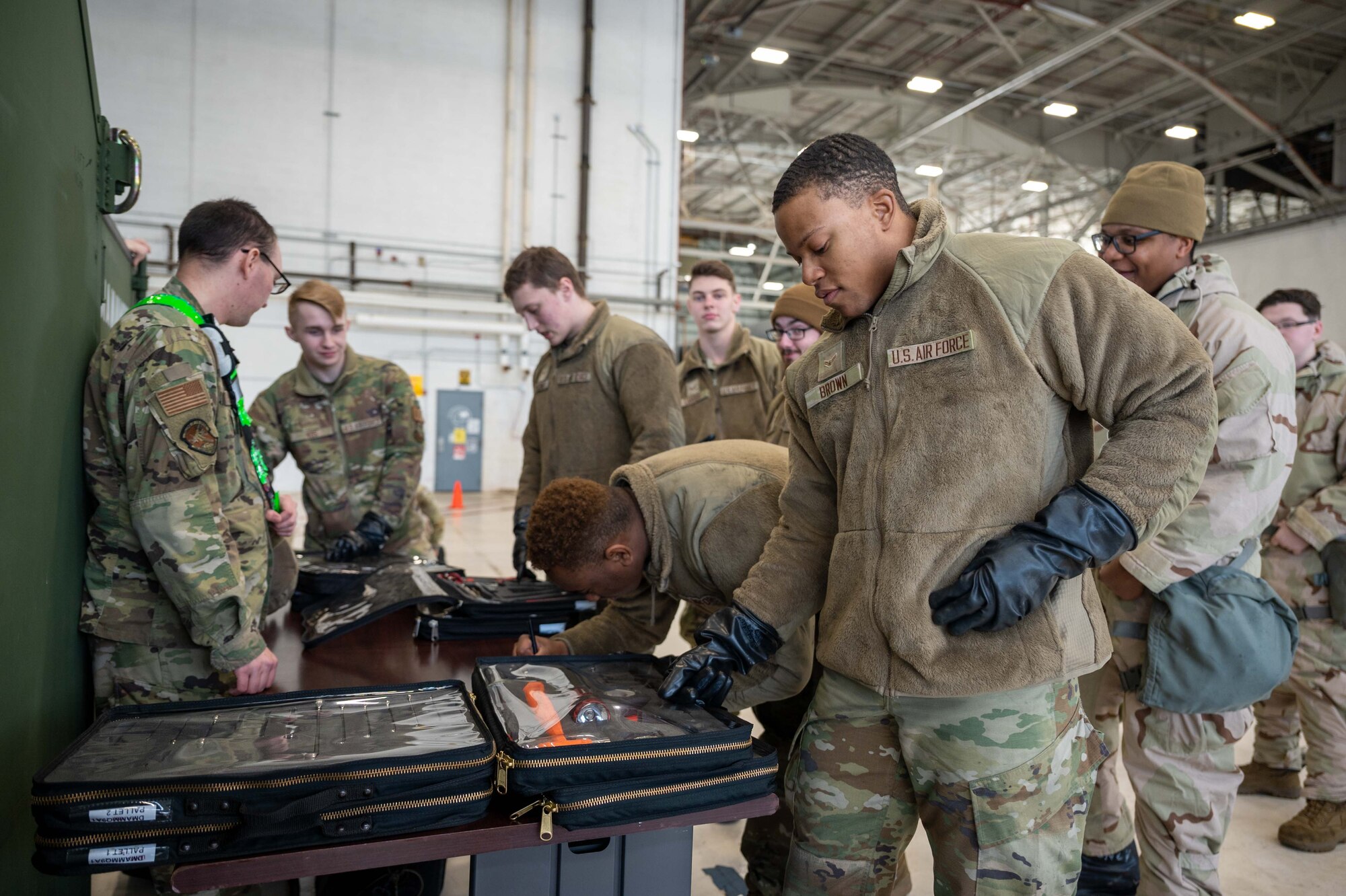 Airman 1st Class Michael Brown, 736th Aircraft Maintenance Squadron C-17 Globemaster III crew chief, inspects a toolbox during the first 436th Mission Generation Group Integration Event at Dover Air Force Base, Delaware, Jan. 20, 2023. This event is the first of monthly readiness exercises that test the ability to perform job tasks in contested environments. (U.S. Air Force Photo by Senior Airman Faith Barron)