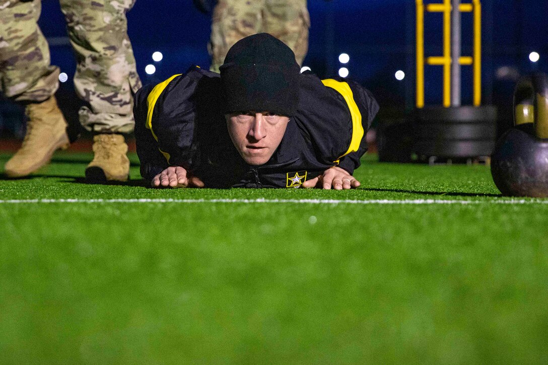 A soldier performs pushups.