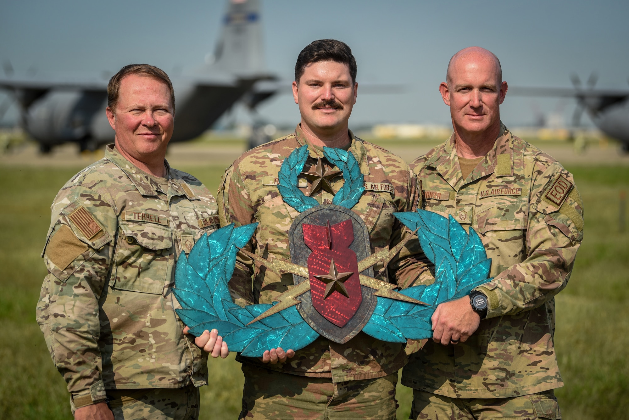 Master Sgt. Christopher R. Terrell (left), Senior Airman John M. Forcht (center) and Master Sgt. Dustin J. Turner (right) from the Kentucky Air National Guard's 123rd Explosive Ordnance Disposal Flight have been awaded Master Blaster of the Year for 2022. The honor recognizes an outstanding United States Air Force EOD Airman, noncommissioned officer and senior noncommissioned officer for their contributions to the unit, base, command and the EOD program. (U.S. Air National Guard photo by Tech. Sgt. Joshua Horton)