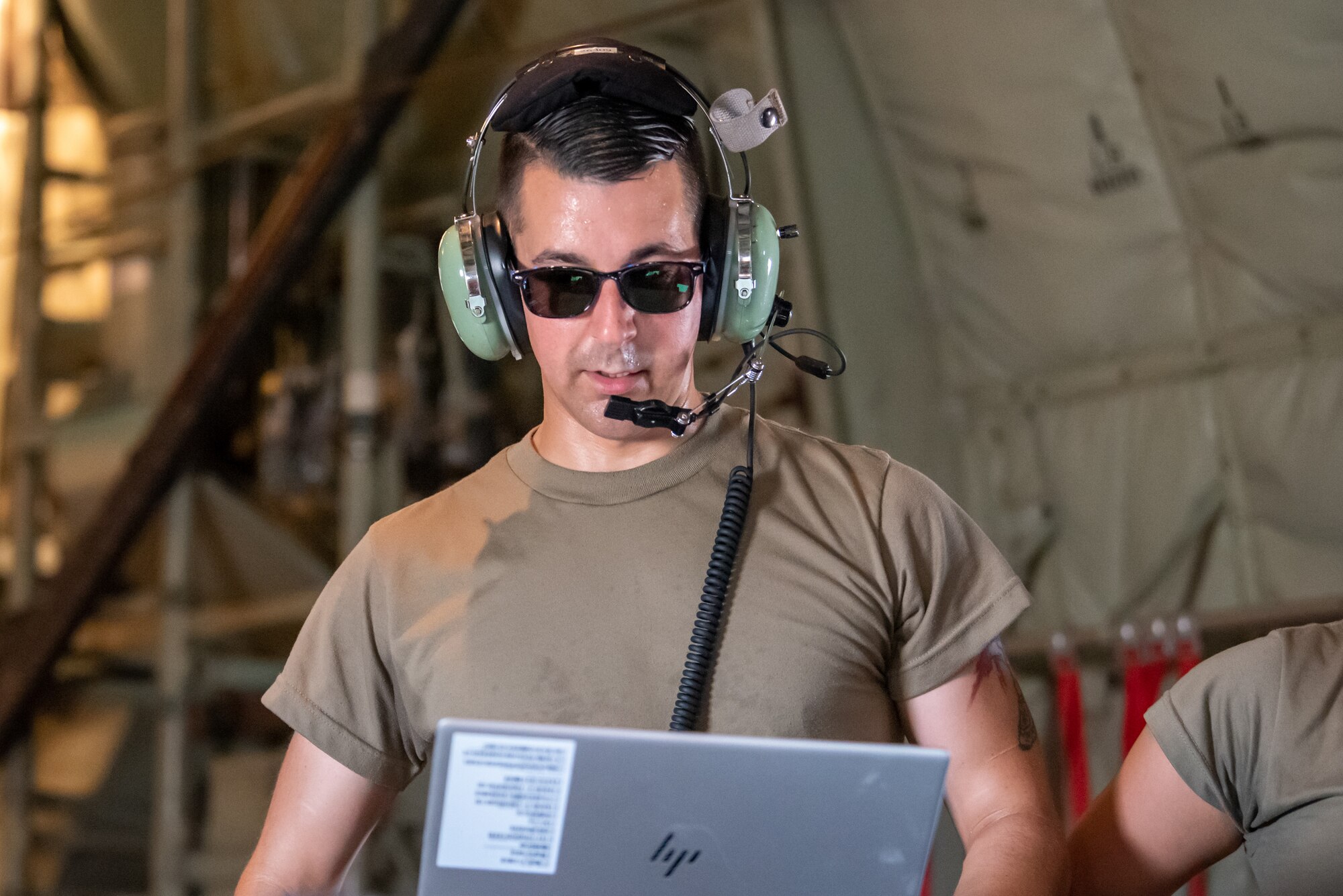 Staff Sgt. Tyler Seamans, a maintainer with the Rhode Island Air National Guard’s 143rd Aircraft Maintenance Squadron, tests how to properly run a vibration analyzer for a C-130J Super Hercules at the Gulfport Combat Readiness Training Center in Gulfport, Miss., Aug. 14, 2022, as part of Maintenance University. More than 300 Air Guardsmen from Kentucky, Texas, West Virginia, Rhode Island and California trained on career-specific proficiencies during the intensive week-long course. (U.S. Air National Guard photo by Senior Airman Madison Beichler)