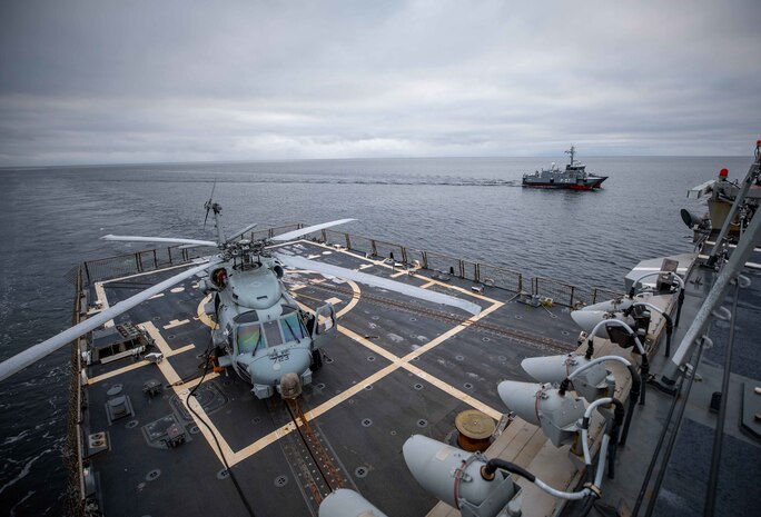 BALTIC SEA (Jan. 23, 2023) The Arleigh Burke-class guided-missile destroyer USS Roosevelt (DDG 80) transits alongside the Latvian patrol boat LV Viesite (P-07) during a passing exercise, Jan. 23, 2023.