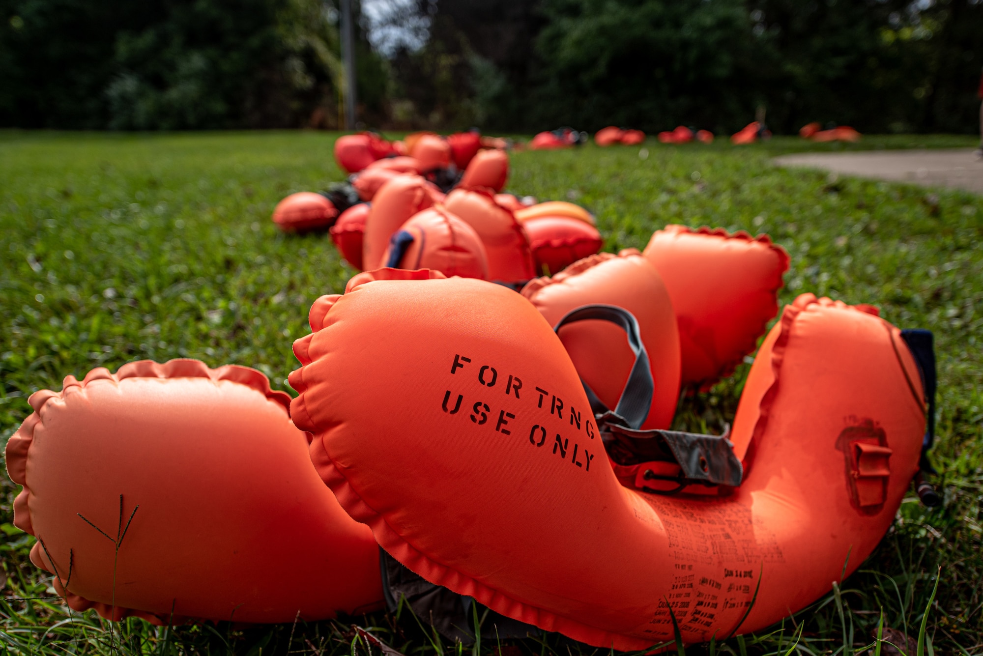 LPU-10/P inflatable life preservers are prepared by aircrew flight equipment specialists from the Kentucky Air National Guard’s 123rd Operations Group to be used for water survival training at Taylorsville Lake in Spencer County, Ky., Sept. 10, 2022. The annual training refreshes aircrew members on skills learned during U.S. Air Force Survival School. (U.S. Air National Guard photo by Tech. Sgt. Joshua Horton)