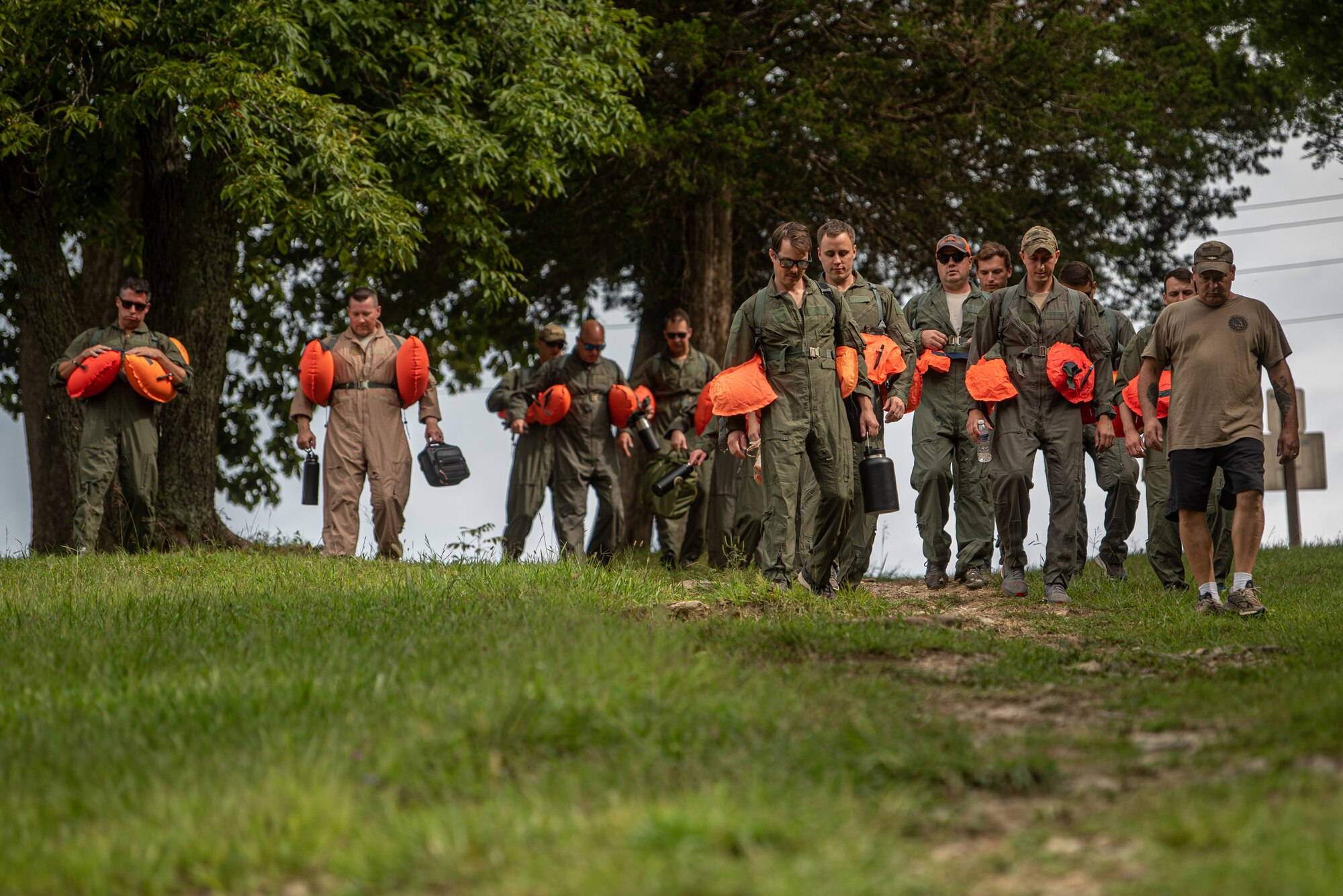 Airmen from the Kentucky Air National Guard’s 123rd Operations Group prepare to participate in water survival training at Taylorsville Lake in Spencer County, Ky., Sept. 10, 2022. The annual training refreshes aircrew members on skills learned during U.S. Air Force Survival School. (U.S. Air National Guard photo by Tech. Sgt. Joshua Horton)