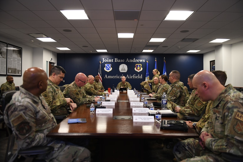 Major General Joel Jackson, Air Force District of Washington commander, gathers with 316th Wing group commanders and senior enlisted leaders for mission briefing Jan. 24, 2023, Joint Base Andrews Md.