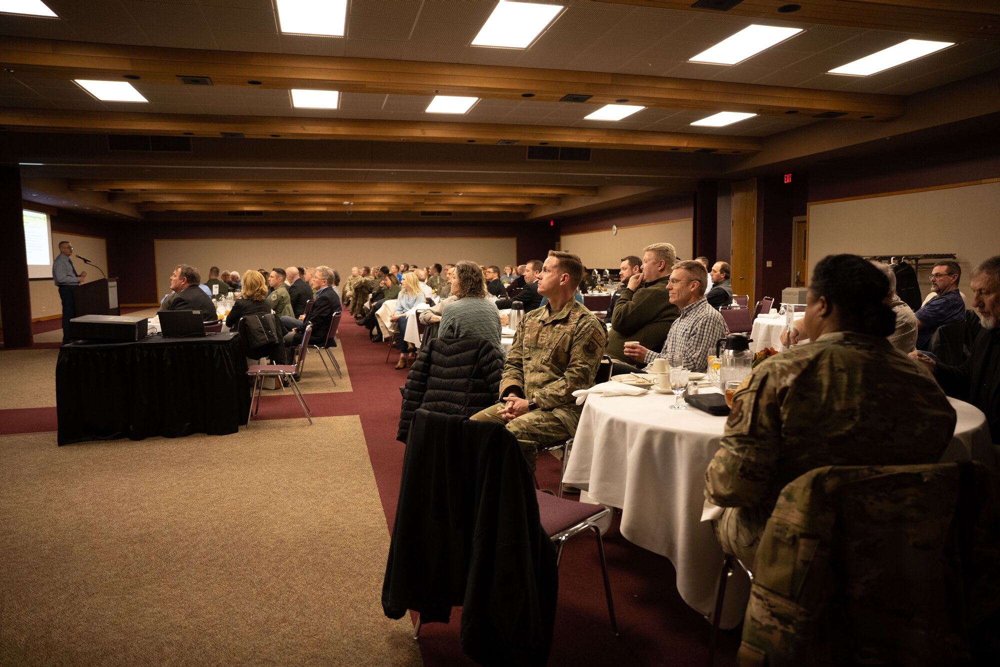 More than 100 area civic and business leaders joined Airmen from Ellsworth Air Force Base, S.D., to recognize individuals completing their terms in the Ellsworth Honorary Commanders Program and welcome 11 new inductees during a special luncheon at The Monument in Rapid City, S.D., Jan. 18. The 28th Bomb Wing commander selects who participates in the program and which Ellsworth unit they will be assigned to for a two-year term. Currently there are 26 area civic and business leaders enrolled in the program. (U.S. Air Force photo by Senior Airman Austin McIntosh)