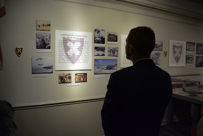 Visitors attend the opening of the 117th Air Refueling Wing history exhibit at the Southern Museum of Flight in Birmingham, Alabama.