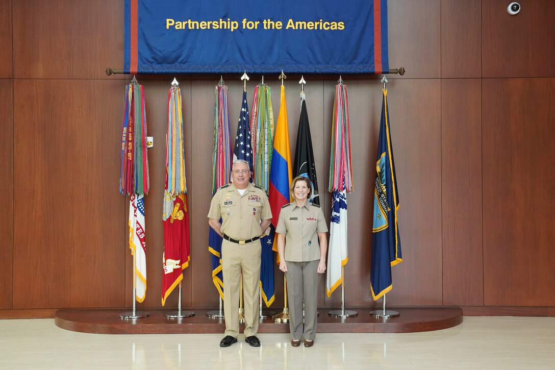 U.S. Army Gen. Laura Richardson, commander of U.S. Southern Command, and the General Commander of the Colombian Military Forces, Gen. Helder Giraldo, pose for a photo at the command's headquarters.