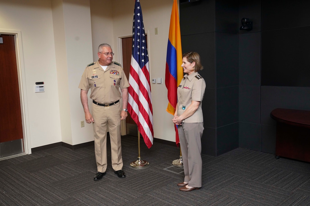 U.S. Army Gen. Laura Richardson and Colombian Gen. Helder Giraldo speak during a meeting at the command's headquarters.