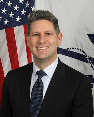 Mr. Russell Rumbaugh, the Assistant Secretary of the Navy (Financial Management & Comptroller), poses for an official photo in the Navy Office of Information studio, Jan 20. Mr. Rumbaugh directly oversees management of the Department of the Navy’s (DON’s) annual budget exceeding $240 billion while leading, mentoring, and developing the DON’s community of over 9,200 financial managers.