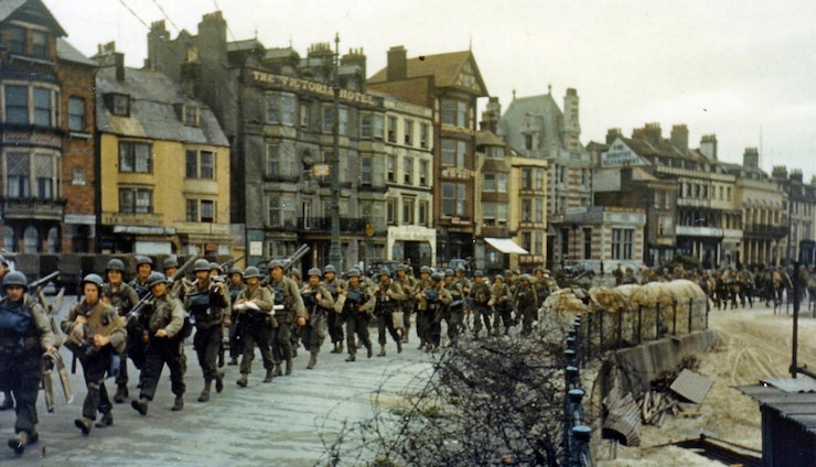The 2nd Battalion U.S. Army Rangers, tasked with capturing the German heavy coastal defence battery at Pointe du Hoc to the west of the D-Day landing zone of Omaha Beach, march to their landing craft in Weymouth, England, on June 5, 1944. The next day, allied soldiers descended on the beaches of Normandy for D-Day - an operation that turned the tide of the Second World War against the Nazis, marking the beginning of the end of the conflict. (U.S. National Archives/Reuters)