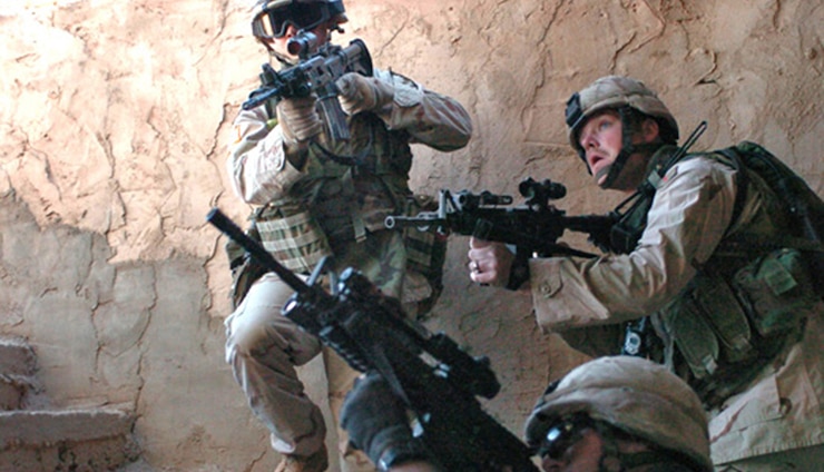 Soldiers from 1st Infantry Division clearing a building in Fallujah, 19 November 2004.