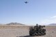 A U.S. Army Origin autonomous weapons system uses a tethered unmanned aerial system to help soldiers perform reconnaissance of an area during Project Convergence 22 experimentation Oct. 26, 2022, on Fort Irwin, Calif. The experiment incorporates technologies and concepts from all services and from multinational partners, including in the areas of autonomy, augmented reality, tactical communications, advanced manufacturing, unmanned aerial systems and long-range fires.