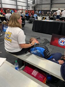 ORLANDO, Florida (Jan. 21, 2023) - Operations Specialist 1st Class Travis Wyatt takes a break between competitions during the 2022 Warrior Games in an undated photo with his wife, Teea Wyatt.
