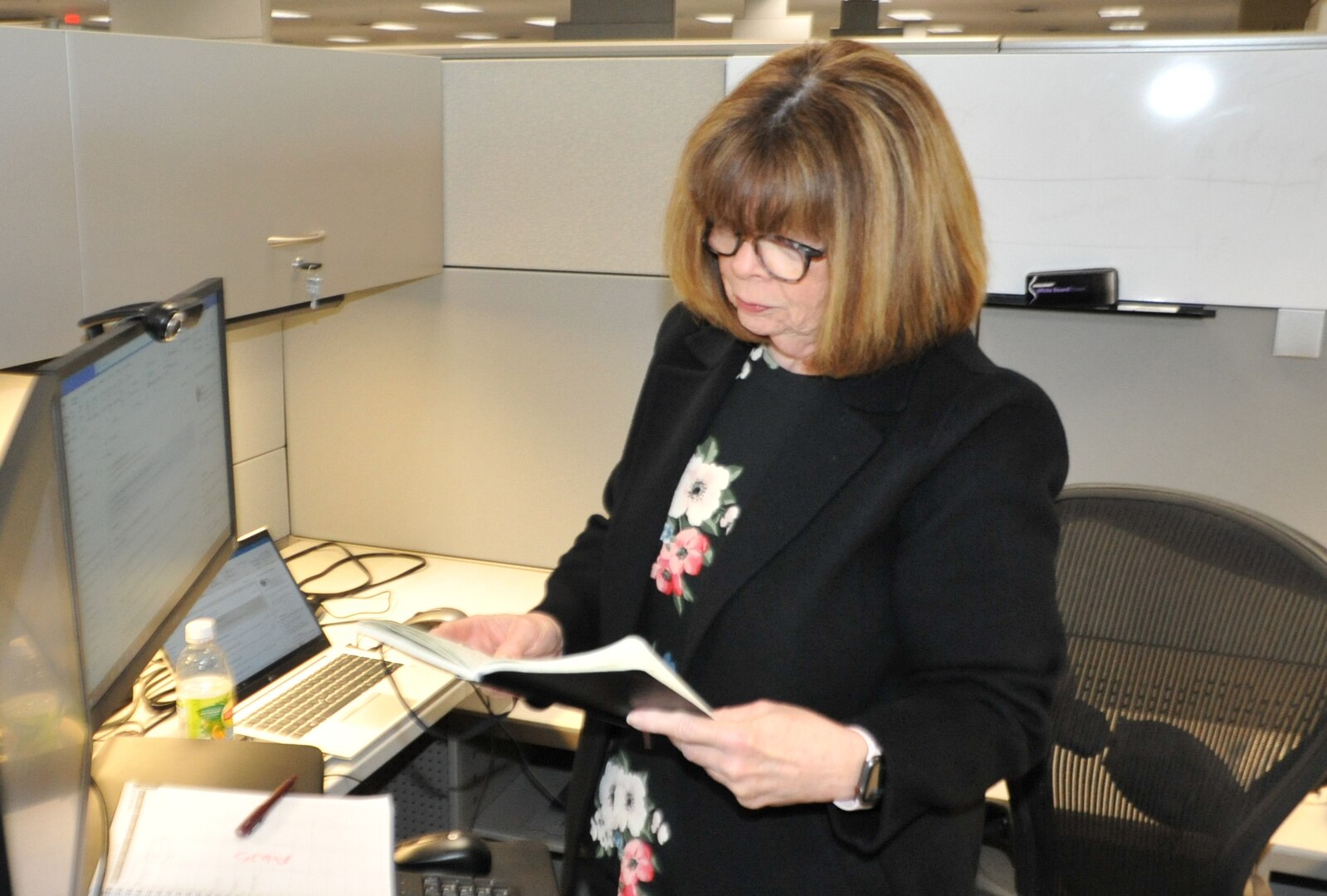 Paula Shaw at her desk