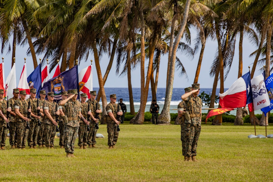 U.S. Marines salute during the Marine Corps Base Camp Blaz Reactivation and Naming Ceremony at Asan Beach, National Historical Park, Asan, Guam, on Jan. 26, 2023. The Reactivation and Naming Ceremony officially recognized the activation and naming of Naval Support Activity, Marine Corps Base (MCB) Camp Blaz after Marine Barracks Guam was deactivated on Nov. 10, 1992. MCB Camp Blaz was administratively activated on October 1, 2020. It is the first newly constructed base for the Marine Corps since 1952 and will serve as an enduring symbol of the continued partnership between the Marine Corps and the Government of Guam, which has existed since the Spanish surrender to U.S. forces on June 21, 1898. (U.S. Marine Corps photo by Lance Cpl. Jonathan Beauchamp)