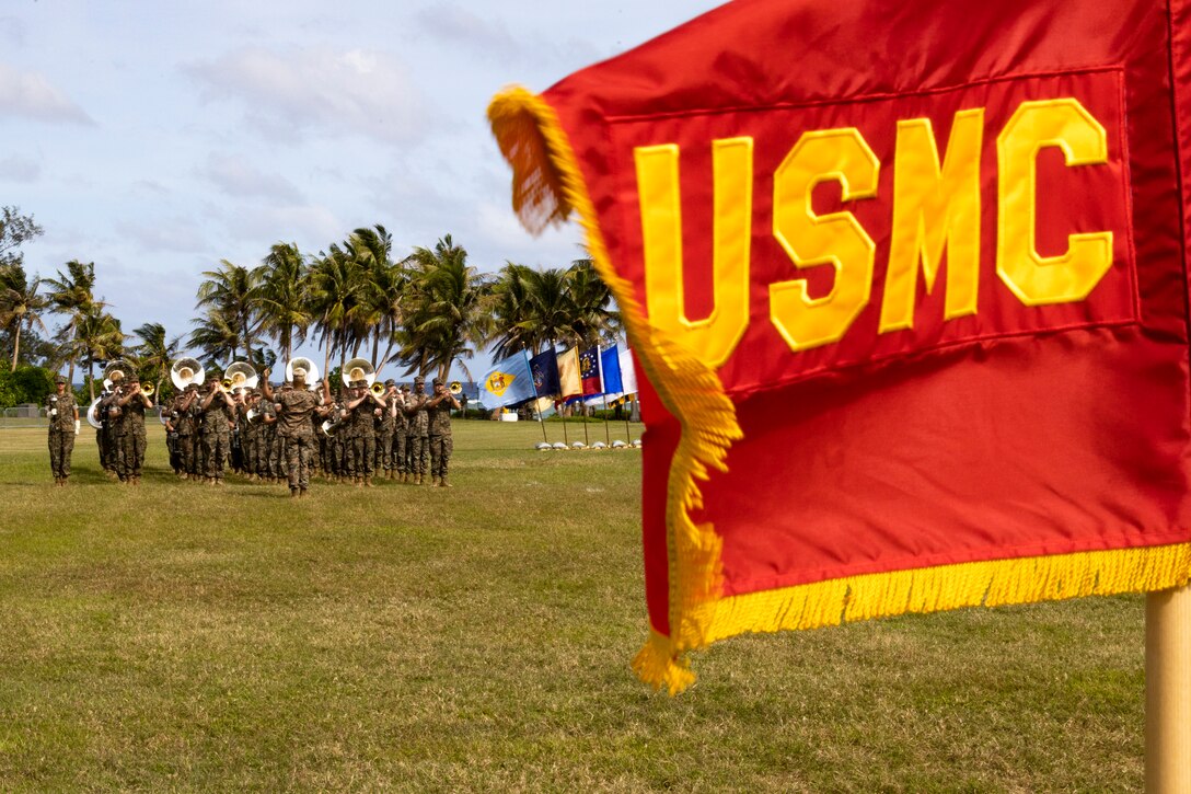 U.S. Marines with Marine Forces Pacific Band march during the Marine Corps Base Camp Blaz Reactivation and Naming Ceremony at Asan Beach, National Historical Park, Asan, Guam, on Jan. 26, 2023. The ceremony officially recognized the activation and naming of Naval Support Activity, MCB Camp Blaz after Marine Barracks Guam was deactivated on Nov. 10, 1992. MCB Camp Blaz was administratively activated on Oct. 1, 2020. It is the first newly constructed base for the Marine Corps since 1952 and will serve as an enduring symbol of the continued partnership between the Marine Corps and the Government of Guam, which has existed since the Spanish surrender to U.S. forces on June 21, 1898. (U.S. Marine Corps photo by Lance Cpl. Jonathan Beauchamp)