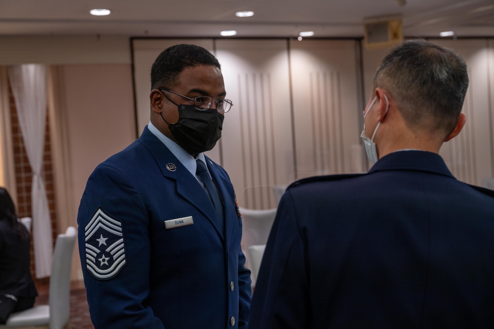 Chief Dunn speaks with a Japan Air Self Defense Force member.