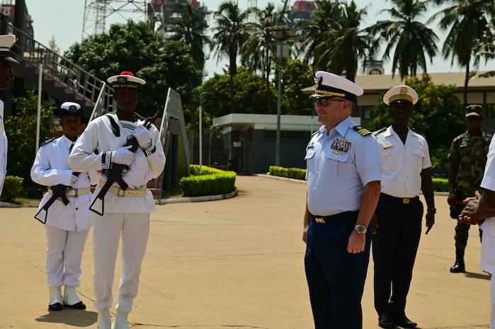 Cmdr. Corey Kerns, commanding officer of USCGC Spencer (WMEC 905), is welcomed by the Togolese Navy in Lomé, Togo, Jan. 25, 2023.