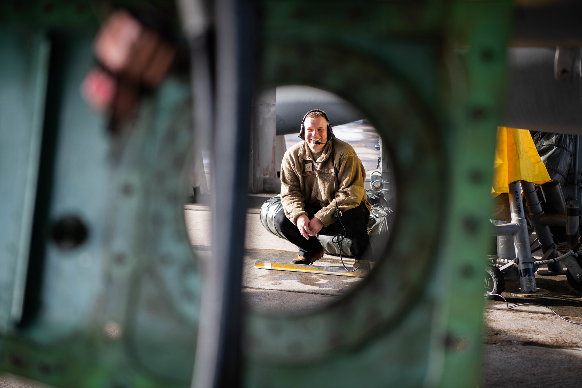 An Airman watches maintenance procedures.