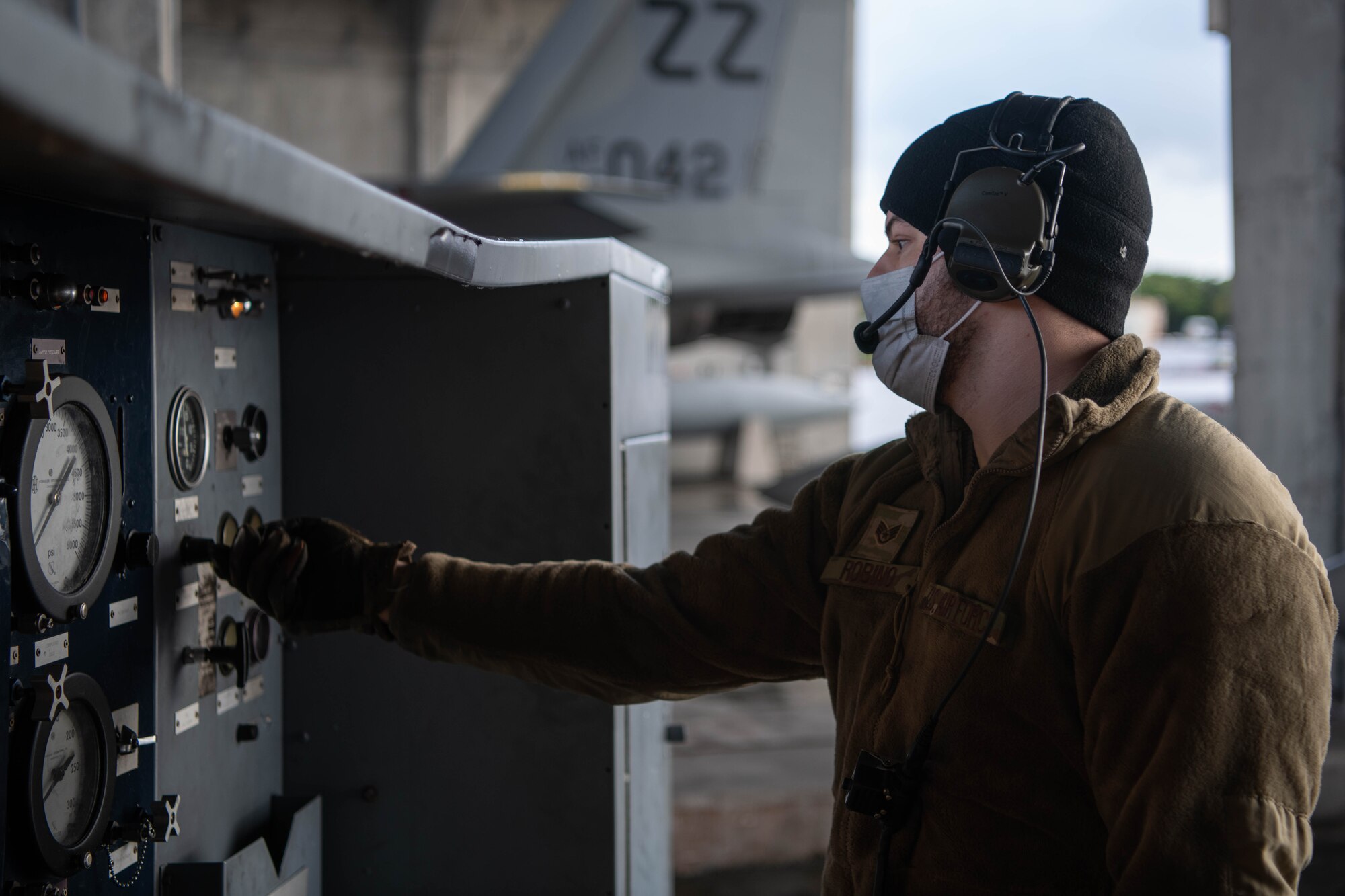 An Airman conducts aircraft maintenance.