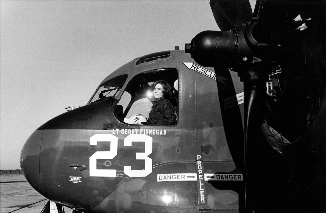 Ensign Rosemary Conaster (later Mariner), assigned to Fleet Composite Squadron (VC) 2, prepares for a flight in a Grumman S-2 Tracker antisubmarine aircraft at Naval Air Station Oceana in Virginia Beach, Virginia, Jan. 9, 1975.