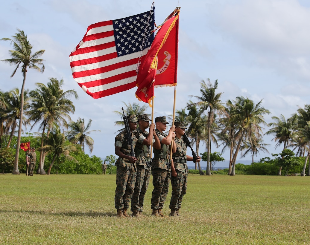 The Marine Corps Base (MCB) Camp Blaz color guard presents the colors at the MCB Camp Blaz Reactivation and Naming Ceremony at Asan Beach, Guam, Jan. 26, 2023. The Reactivation and Naming Ceremony officially recognized the activation and naming of Naval Support Activity, Marine Corps Base Camp Blaz after Marine Barracks Guam was deactivated on Nov. 10, 1992. The future relocation of forces to Guam honors the Defense Policy Review Initiative, an international agreement with the Government of Japan, and it secures a Marine Corps posture in the Indo-Pacific region that is geographically distributed, operationally resilient and politically sustainable. (U.S. Marine Corps photo by Lance Cpl. Garrett Gillespie)