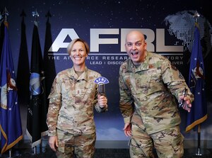 Air Force Research Laboratory, or AFRL, Commander Maj. Gen. Heather Pringle, left, pictured with Chief Master Sgt. James “Bill” Fitch, AFRL command chief, right, joins the “Lab Life” podcast at Wright-Patterson Air Force Base, Ohio, Jan. 4, 2023. Pringle discussed her vision for AFRL in 2023 on “Lab Life,” an AFRL Public Affairs podcast that brings listeners behind the scenes with Department of the Air Force scientists, engineers and professionals. (U.S. Air Force photo / Kenneth McNulty)