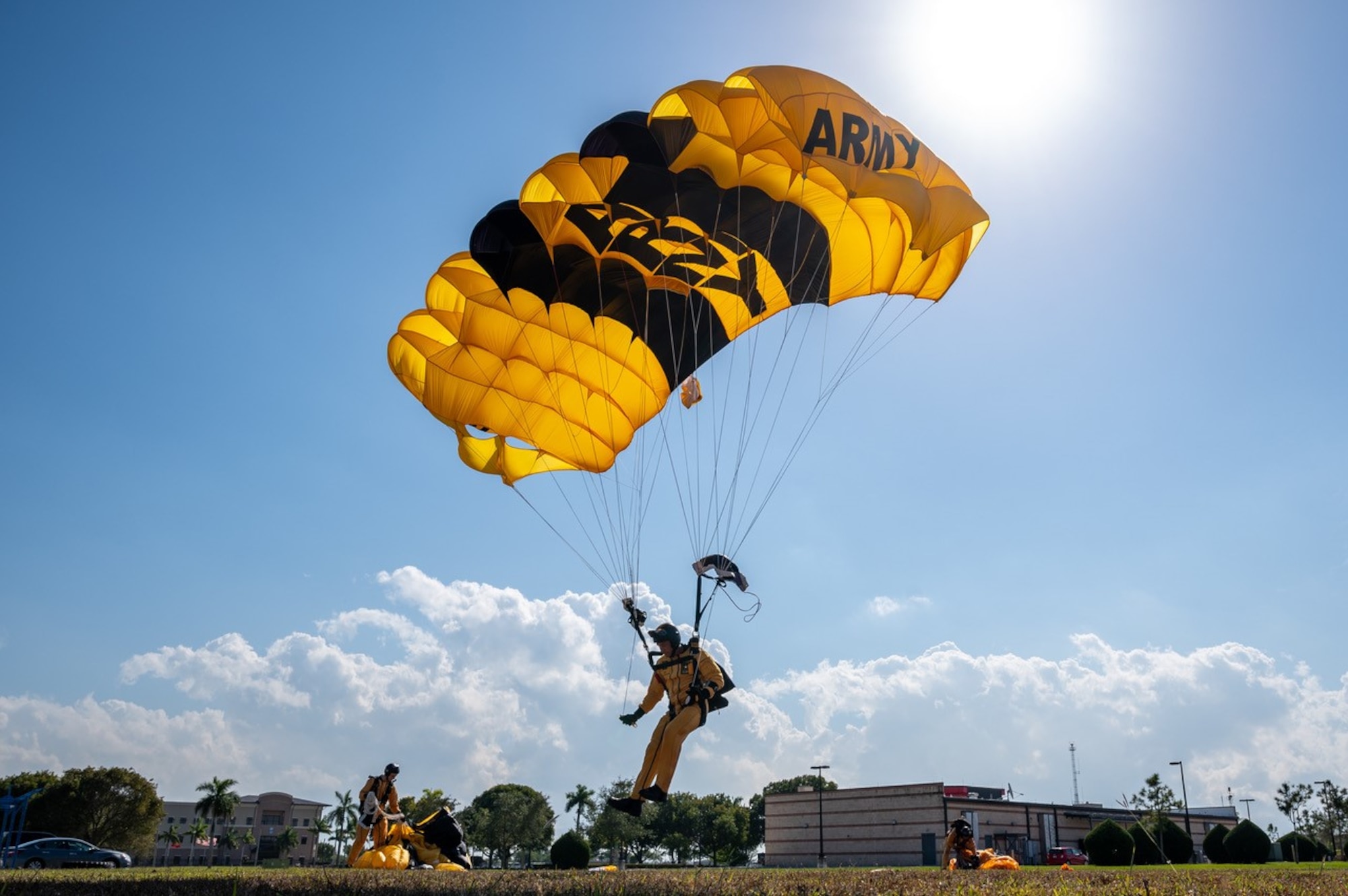 A member ofo the U.S. Army Parachute Team, The Golden Knights prepare to land on the drop zone during Winter Training on Jan. 26, 2023. (U.S. Air Force photo by Tech. Sgt. Leo Castellano)