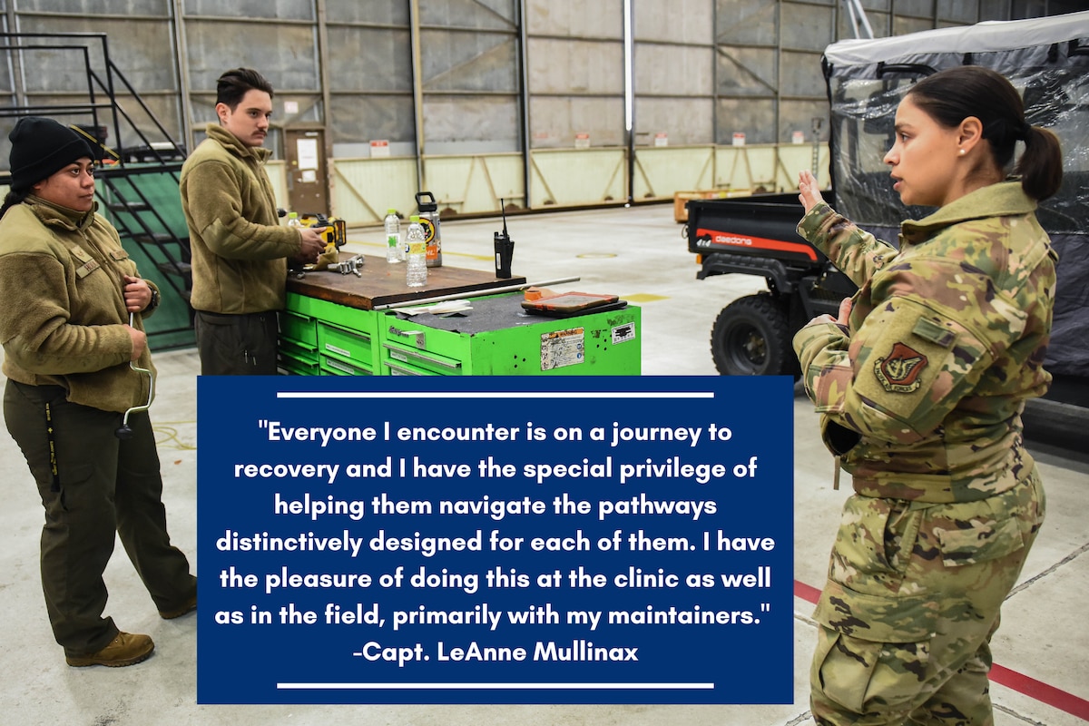 Capt. LeAnne Mullinax (right), 8th Operational Medical Readiness Squadron mental health element chief, engages with maintainers from the 80th Fighter Generation Squadron at Kunsan Air Base, Republic of Korea, Jan. 26, 2023. The mental health clinic at Kunsan has implemented a frontline care strategy to be more accessible to base personnel by meeting them where they work. (U.S. Air Force photo illustration by 1st Lt. Cameron Silver)