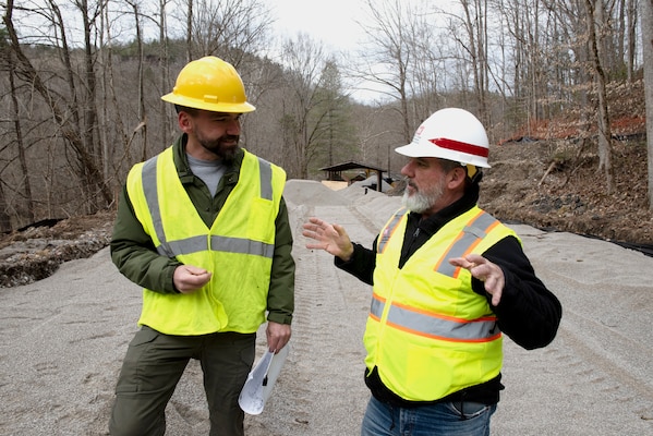 Greg Bishop (Right), senior Interagency and International Services (IIS) project manager and acting program manager for the U.S. Army Corps of Engineers Nashville District, and Kenny Gilreath, chief of Facility Management for the Big South Fork National River Recreation Area, Obed National Wild and Scenic River, and Manhattan Project National Historical Park in Oak Ridge, discuss the way forward for a wastewater construction project at the National Park Service Blue Heron Mine at the Big South Fork National River and Recreation Area in Stearns, Kentucky. (USACE Photo by Lee Roberts)