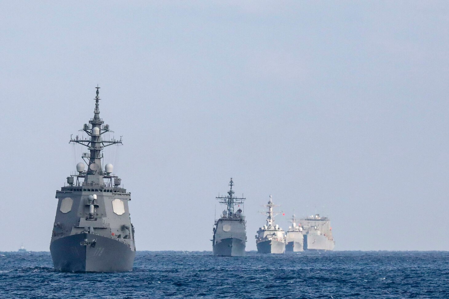 From left to right, the Japan Maritime Self-Defense Force Atago-class guided-missile destroyer JS Ashigara (DDG 178), the Ticonderoga-class guided-missile cruiser USS Shiloh (CG 67), the Arleigh Burke-class guided-missile destroyer USS Rafael Peralta (DDG 115), the Ticonderoga-class guided-missile cruiser USS Antietam (CG 54), the Lewis and Clark-class dry cargo ship USNS Washington Chambers (T-AKE 11) and the Ticonderoga-class guided-missile cruiser USS Chancellorsville (CG 62), not pictured, steam in formation in the Philippine Sea, Jan 20. Chancellorsville is assigned to Commander, Task Force 70/Carrier Strike Group 5 underway preforming routine operations in support of a free and open Indo-Pacific.