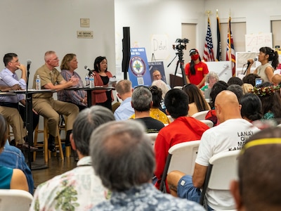 During a town hall event hosted by the Environmental Protection Agency (EPA), a community member asks a question at the Oahu Veterans Council and Center in Honolulu, Hawaii Jan. 18, 2023.