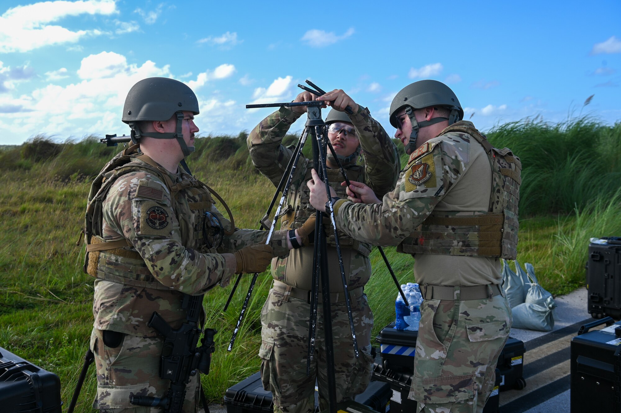 U.S. Air Force Airman with the 644th Combat Communications Squadron, set up communication capabilities on Pacific Air Forces Regional Training Center-Andersen Air Force Base, Guam, Jan. 19, 2023. As part of the 36th Contingency Response Group, the 644th CBCS practiced setting up communications in a remote location during a Field Training Exercise. (U.S. Air Force photo by Airman 1st Class Allison Martin)