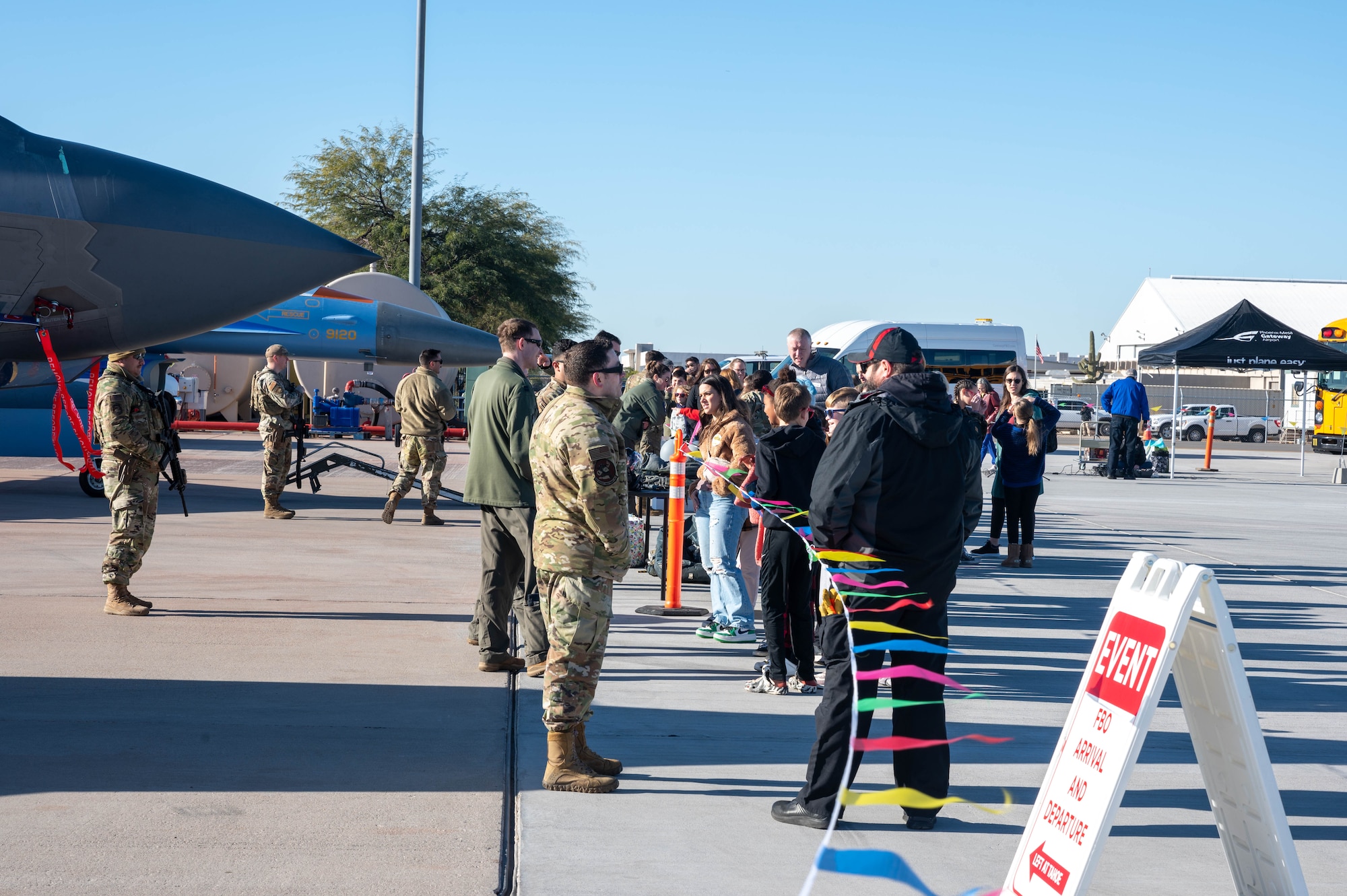Airmen from the 56th Fighter Wing, assigned to Luke Air Force Base, Arizona, showcase F-35 Lightning II and F-16 Fighting Falcon aircraft during the Mesa Gateway Aviation Day, Jan. 24, 2023, in Mesa, Arizona.