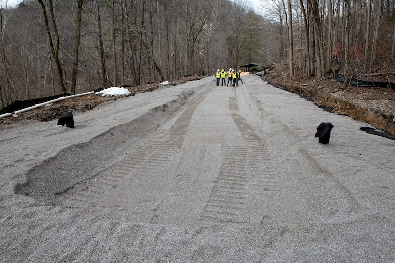 U.S. Army Corps of Engineers Nashville District and National Park Service officials review the progress of construction for a wastewater project underway to provide a sanitary upgrade for the National Park Service Blue Heron Mine at the Big South Fork National River and Recreation Area in Stearns, Kentucky. (USACE Photo by Lee Roberts)