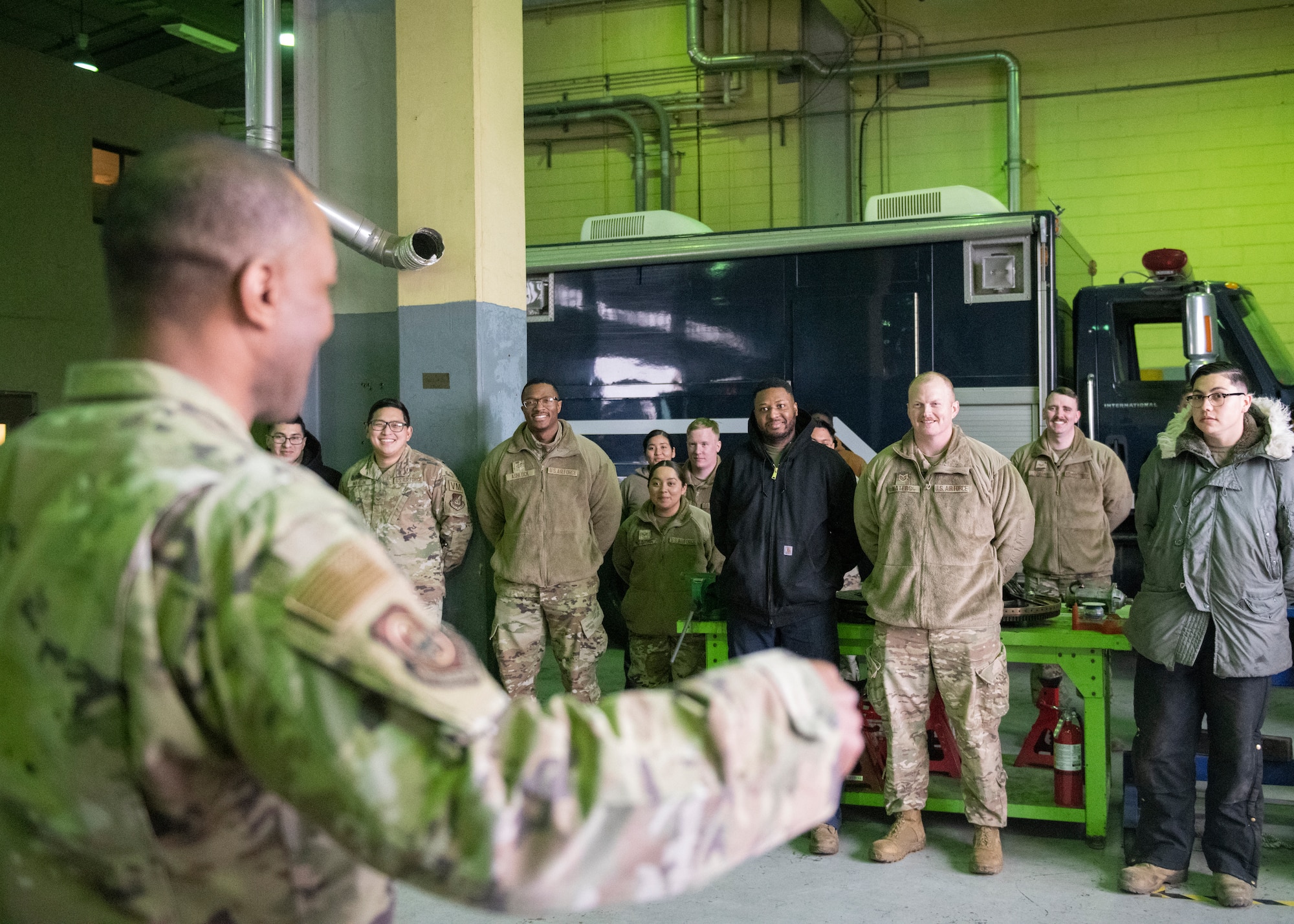 U.S. Air Force Chief Master Sgt.’s Alvin R. Dyer (left), 7th Air Force command chief, meets with Airmen from the 8th Logistics Readiness Squadron vehicle maintenance flight at Kunsan Air Base, Republic of Korea, Jan. 26, 2023. The 8th LRS VM flight keeps the 8th Fighter Wing mobile, conducting maintenance on vehicles, from electric to diesel to include emergency response vehicles. (U.S. Air Force photo by Staff Sgt. Isaiah J. Soliz)