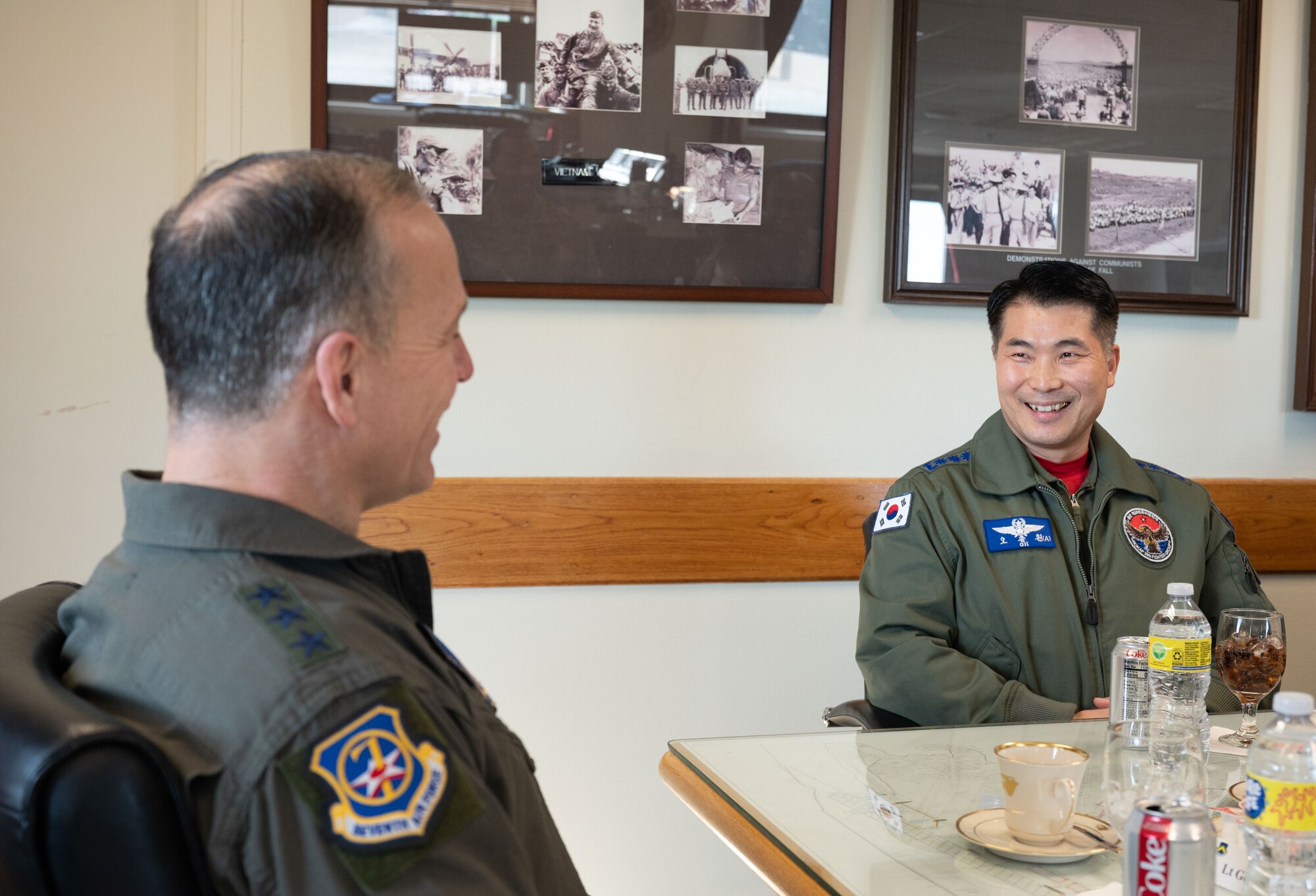 U.S. Air Force Lt. Gen. Scott L. Pleus, 7th Air Force commander, talks with Republic of Korea Air Force Col. Oh Choong-Won, 38th Fighter Group commander, at Kunsan Air Base, Republic of Korea, Jan. 25, 2023. During their visit, both commanders spoke with 8th Fighter Wing leaders to discuss how they can partner together to improve quality-of-life for the Wolf Pack to support the Airmen behind the mission. (U.S. Air Force photo by Staff Sgt. Sadie Colbert)