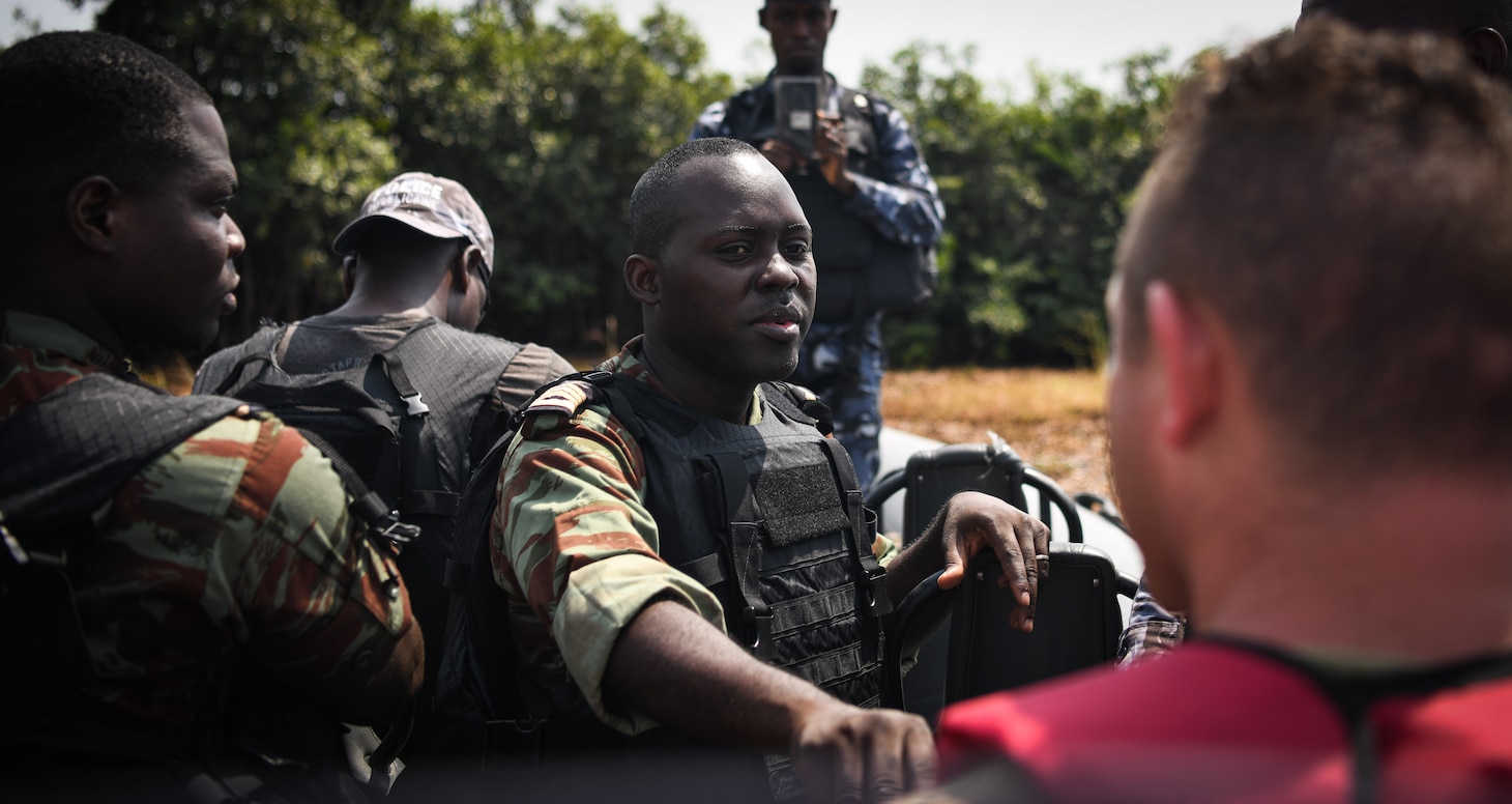 230125-N-DK722-1004 (Jan. 25, 2023) LAGOS, Nigeria – Benin Navy Maitre Major (MTM) Hermann Hungije addresses Benin Navy and Police Force personnel, and U.S. Coast Guard personnel from Law Enforcement Detachment 403, as they conduct Visit, Board, Search and Seizure training during Obangame Express 2023, in Lagos, Nigeria, Jan. 25, 2023. Obangame Express 2023, conducted by U.S. Naval Forces Africa, is a maritime exercise designed to improve cooperation, and increase maritime safety and security among participating nations in the Gulf of Guinea and Southern Atlantic Ocean. U.S. Sixth Fleet, headquartered in Naples, Italy, conducts the full spectrum of joint and naval operations, often in concert with allied and interagency partners, in order to advance U.S. national interests and security and stability in Europe and Africa. (U.S. Navy photo by Mass Communication Specialist 1st class Cameron C. Edy)