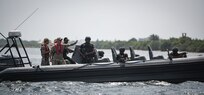 230125-N-DK722-1003 (Jan. 25, 2023) LAGOS, Nigeria – Benin Navy and Police Force personnel, alongside U.S. Coast Guard personnel from Law Enforcement Detachment 403, conduct Visit, Board, Search and Seizure training during Obangame Express 2023, in Lagos, Nigeria, Jan. 25, 2023. Obangame Express 2023, conducted by U.S. Naval Forces Africa, is a maritime exercise designed to improve cooperation, and increase maritime safety and security among participating nations in the Gulf of Guinea and Southern Atlantic Ocean. U.S. Sixth Fleet, headquartered in Naples, Italy, conducts the full spectrum of joint and naval operations, often in concert with allied and interagency partners, in order to advance U.S. national interests and security and stability in Europe and Africa. (U.S. Navy photo by Mass Communication Specialist 1st class Cameron C. Edy)