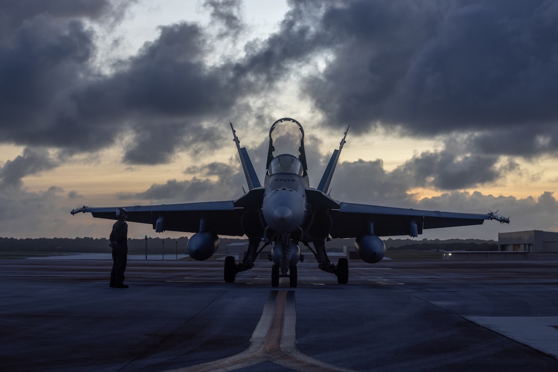 A U.S. Marine with Fighter Attack Squadron (VMFA) 312 visually inspects an F/A-18C Hornet aircraft at Andersen Air Force Base, Guam, Jan. 25, 2023. VMFA-312 traveled from Marine Corps Air Station Iwakuni, Japan to Andersen Air Force Base, Guam to conduct joint-level training as a part of the Aviation Training Relocation Program and enhance the squadron’s readiness and combat capabilities.
