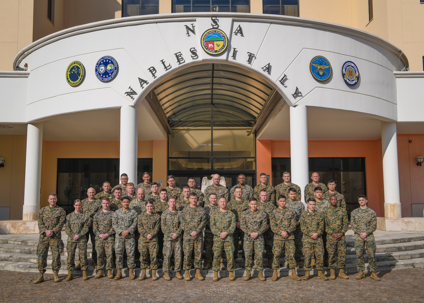 U.S. Marines assigned to Task Force 61 pose for a group photo at Naval Support Activity, Naples, Italy, Jan. 27, 2023.