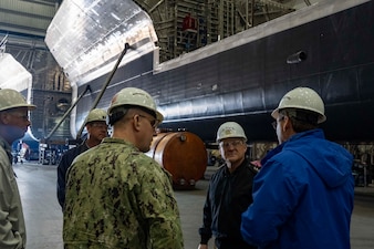 MOBILE, Alabama (Jan, 26, 2023) - Chief of Naval Operations Adm. Mike Gilday tours Austal USA Shipyard in Mobile, Alabama, Jan. 26. During his visit, he toured the facility, visited with employees and was briefed on advancements in technology and capabilities for current and future plans and operations. (U.S. Navy photo by Amanda R. Gray/released)