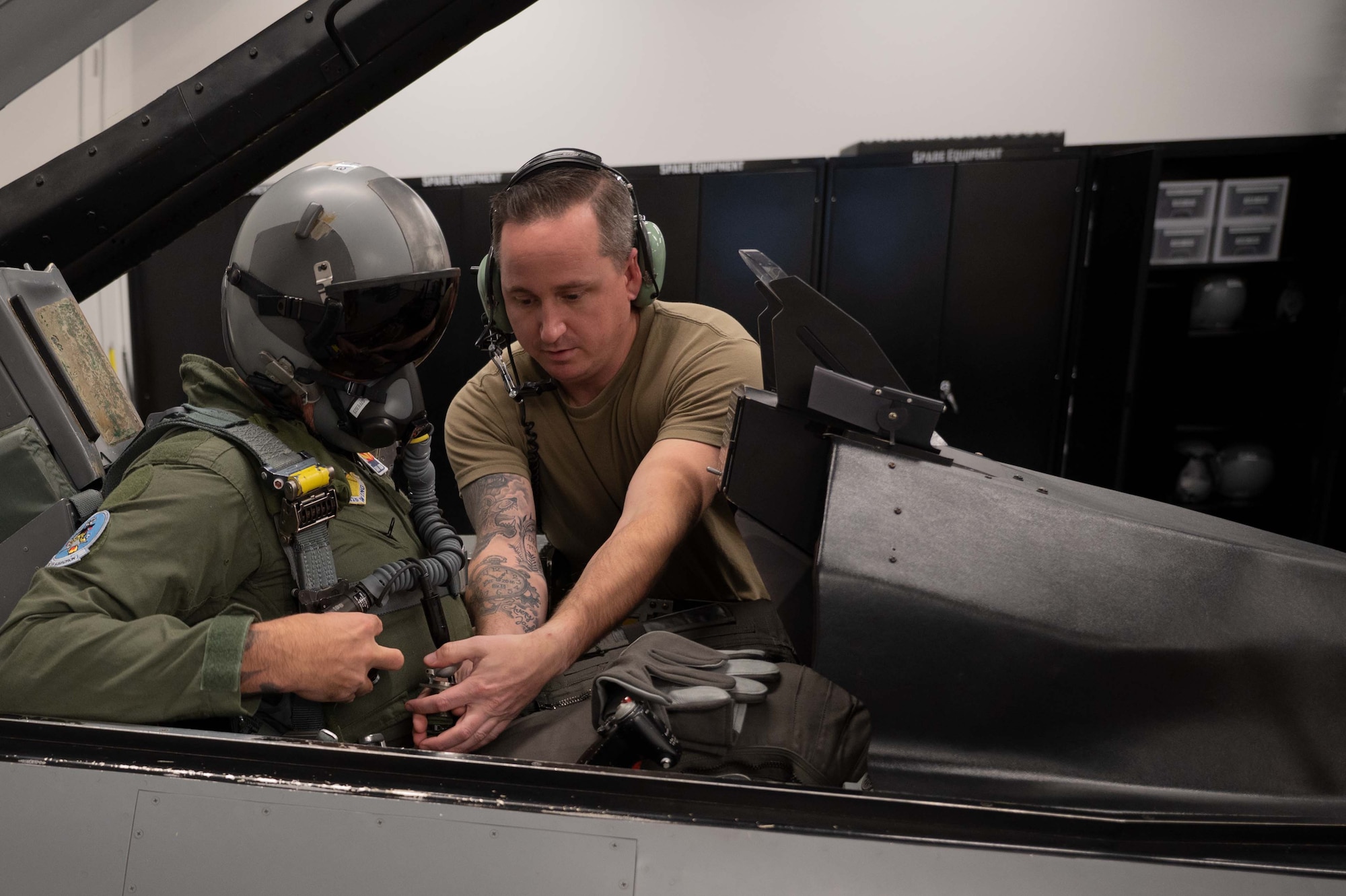 Chad Kasmar, Tucson Police Department Chief of Police, gets pre-flight instruction from 162nd Wing Aircrew Flight Equipment operators before taking flight in an F-16 with Col. Brant Putnam, the 162nd Wing Vice Commander, as his pilot. (U.S. Air Force photo by Maj. Angela Walz)